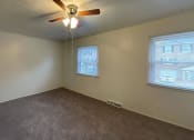 Thumbnail 20 of 22 - Large bedrooms with ceiling fans at Woodland Pointe Apartments and Townhomes, Integrity Realty, 44240
