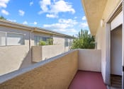 Thumbnail 11 of 15 - Balcony facing interior courtyard of Tilden 2 Apartments.