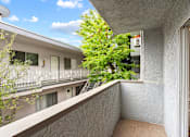 Thumbnail 12 of 15 - Balcony looking out from Vinton Apartments.