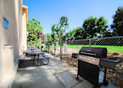 Thumbnail 13 of 18 - Outdoor barbeque space adjacent and connected to neighboring park space.