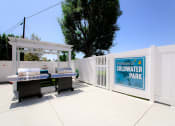 Thumbnail 13 of 22 - The entry to our private community park with barbecues and seating area.