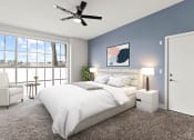 Thumbnail 7 of 22 - Bedroom with gorgeous window view and ceiling fan.