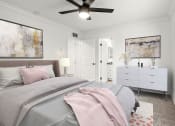 Thumbnail 4 of 25 - Carpeted bedroom with ceiling fan and access to private bathroom.