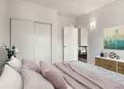 Thumbnail 4 of 23 - Carpeted bedroom with private closet.