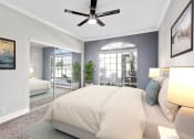 Thumbnail 4 of 20 - Carpeted bedroom featuring beautiful natural lighting and ceiling fan.
