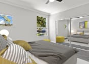 Thumbnail 5 of 27 - Carpeted bedroom with ceiling fan.