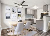 Thumbnail 4 of 16 - Hardwood floored dining room with ceiling fan and view of kitchen.