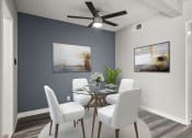 Thumbnail 10 of 28 - Hardwood floored dining area with celling fan.