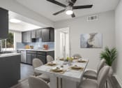 Thumbnail 6 of 28 - Hardwood floored dining room with ceiling fan and view of kitchen.