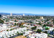 Thumbnail 22 of 22 - Aerial drone shot of the building and Pico Fairfax neighborhood.