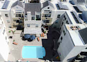 Thumbnail 23 of 24 - Drone image of the pool and roofs with white solar coating to lower our carbon footprint.