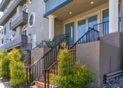 Thumbnail 18 of 20 - Entrance to Chateau Encino including drought tolerant landscaping.
