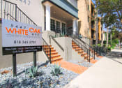 Thumbnail 17 of 20 - Entrance to Chateau Encino including drought tolerant landscaping.