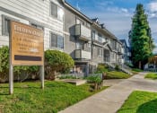 Thumbnail 14 of 15 - Street view of Tilden Oaks Apartments.