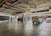 Thumbnail 17 of 23 - Enclosed garage with assigned parking.