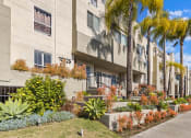 Thumbnail 25 of 27 - Entrance of Palms Court Apartments.