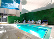 Thumbnail 26 of 31 - Jacuzzi at Catalina Apartments which can accommodate up to 15 people.