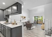 Thumbnail 6 of 23 - Spacious and open kitchen area with view of living room and balcony.