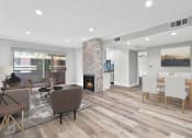 Thumbnail 7 of 23 - Hardwood floor living room and dining room with view of kitchen.
