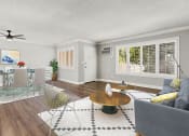 Thumbnail 4 of 24 - Hardwood floored living room with view of dining area.