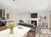 Thumbnail 4 of 15 - Living room with hardwood floor and view of dining room and kitchen area.