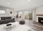 Thumbnail 5 of 15 - Living room with hardwood floors and view of balcony.