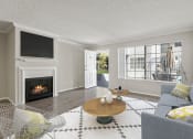 Thumbnail 7 of 15 - Living room with hardwood floor and large windows for natural light.