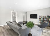 Thumbnail 10 of 23 - Large hardwood floored living rooms with can lights