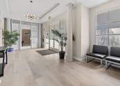 Thumbnail 22 of 27 - Stylish modern lobby at Palms Court Apartments