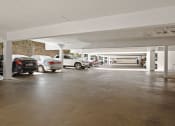 Thumbnail 18 of 24 - Large covered parking lot at National Apartments.