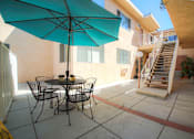 Thumbnail 7 of 18 - Courtyard picnic space adjacent to solar heated pool.
