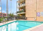 Thumbnail 17 of 21 - Swimming pool in the courtyard of Chandler Circle Apartments.