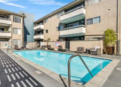 Thumbnail 17 of 29 - View from covered pool cabana lounging space
