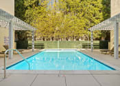 Thumbnail 18 of 27 - Courtyard pool at Palms Court Apartments