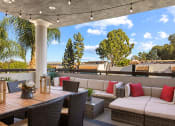 Thumbnail 15 of 20 - Rooftop lounge and dining area.