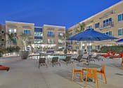 Thumbnail 6 of 35 - Landscape lighting creates outdoor ambiance in the beautiful pool courtyard at The Mosaic on Broadway, San Antonio, 78215