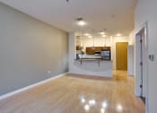 Thumbnail 33 of 35 - Shiny hardwood floors in organic finishing apartment Living Room at The Mosaic on Broadway, San Antonio, TX, 78215