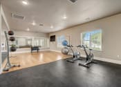 Thumbnail 33 of 48 - our apartments have a gym with a treadmill and elliptical