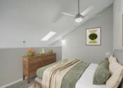 Thumbnail 10 of 28 - an attic bedroom with a bed and a ceiling fan