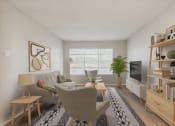 Thumbnail 2 of 19 - a living room with white walls and hardwood floors