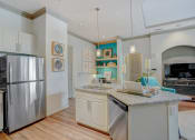 Thumbnail 22 of 52 - a kitchen with stainless steel appliances and a granite counter top