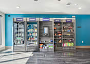 Thumbnail 39 of 49 - A store with a blue wall and a sign that says "refuel" on it.