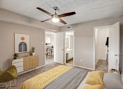 Thumbnail 5 of 42 - a bedroom with a bed and a ceiling fan