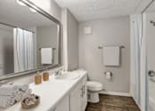 Thumbnail 7 of 42 - a bathroom with a toilet sink and shower