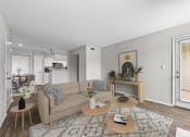 Thumbnail 1 of 29 - a living room with a couch and a tv