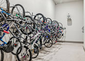 Thumbnail 38 of 49 - A room full of bicycles is shown.