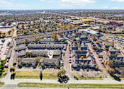 Thumbnail 33 of 35 - A bird's eye view of a residential area with a marker indicating a specific house.