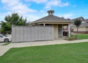 Thumbnail 44 of 48 - a garage with a fence in front of a house