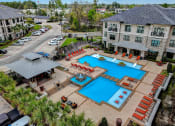 Thumbnail 47 of 52 - an aerial view of the resort style pool at the estates at spring valley