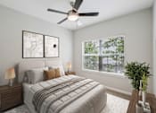 Thumbnail 25 of 70 - A bedroom with a bed, two lamps, a ceiling fan, and a window with blinds.